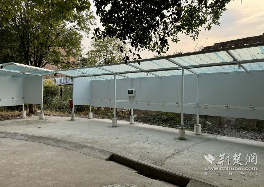 电动车找到新“家” 暖心车棚为小区安全加码